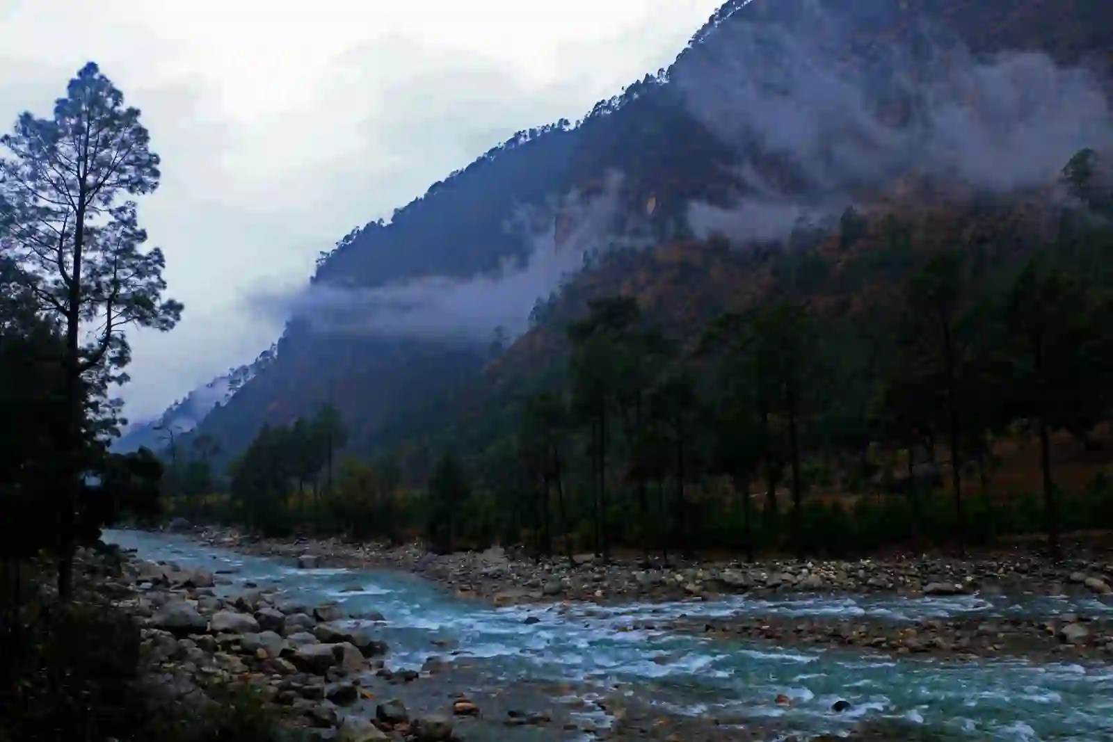 A misty river valley in the hills near Dehradun